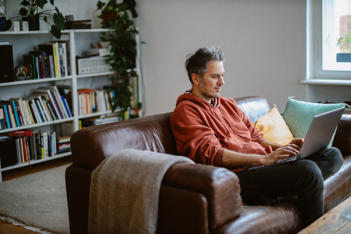 Man using laptop.