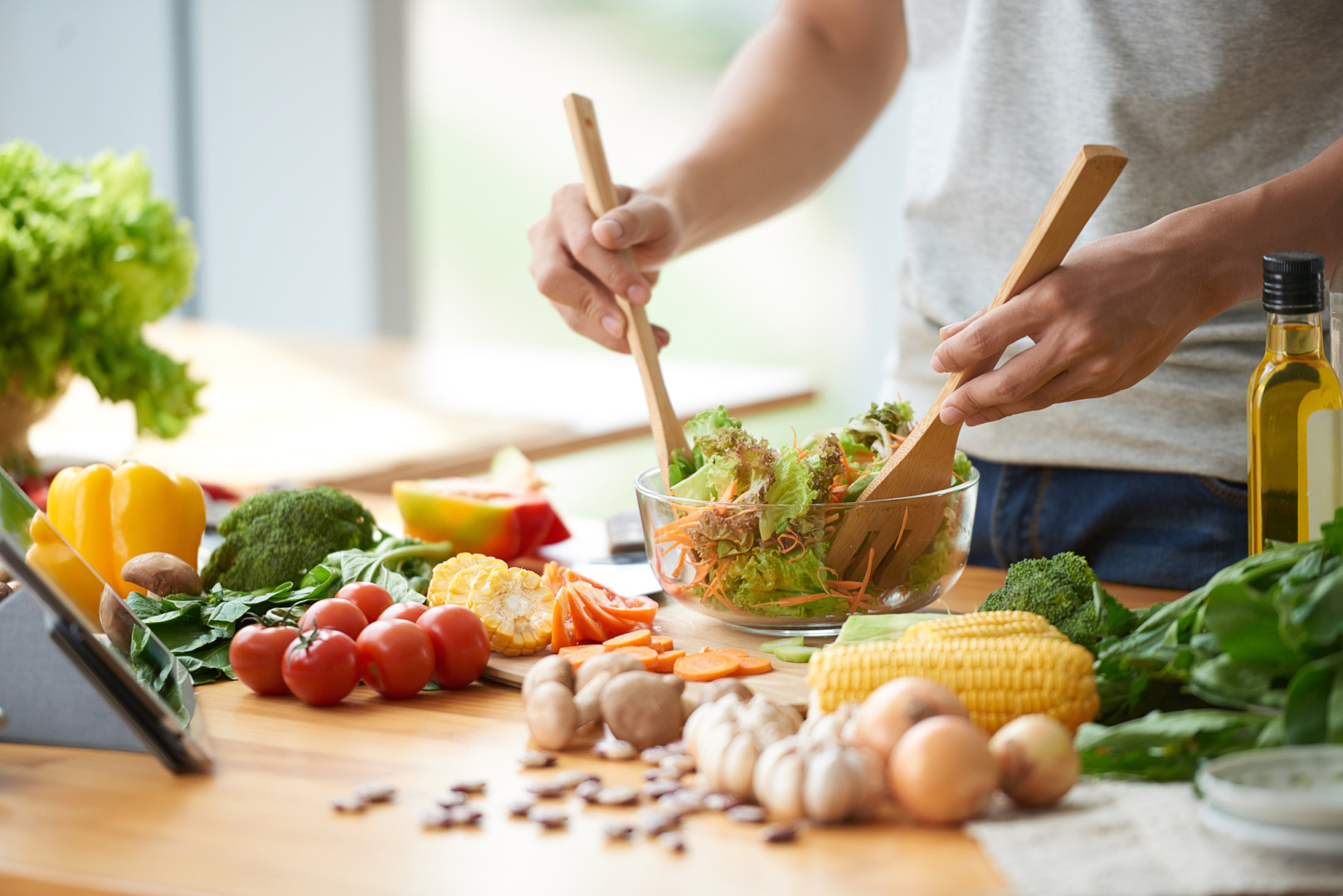 Healthy salad being prepared.