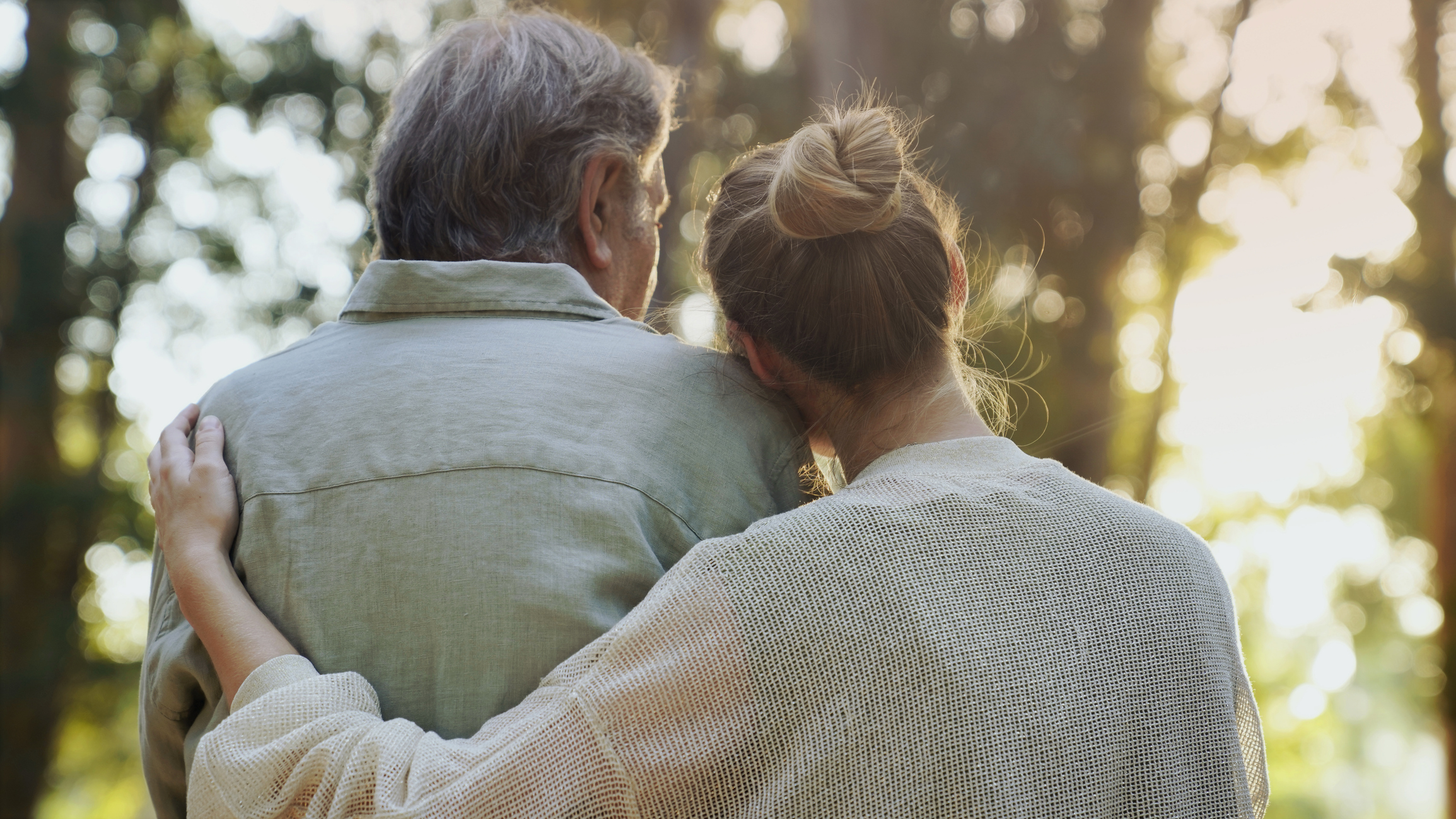 Two people comforting each other